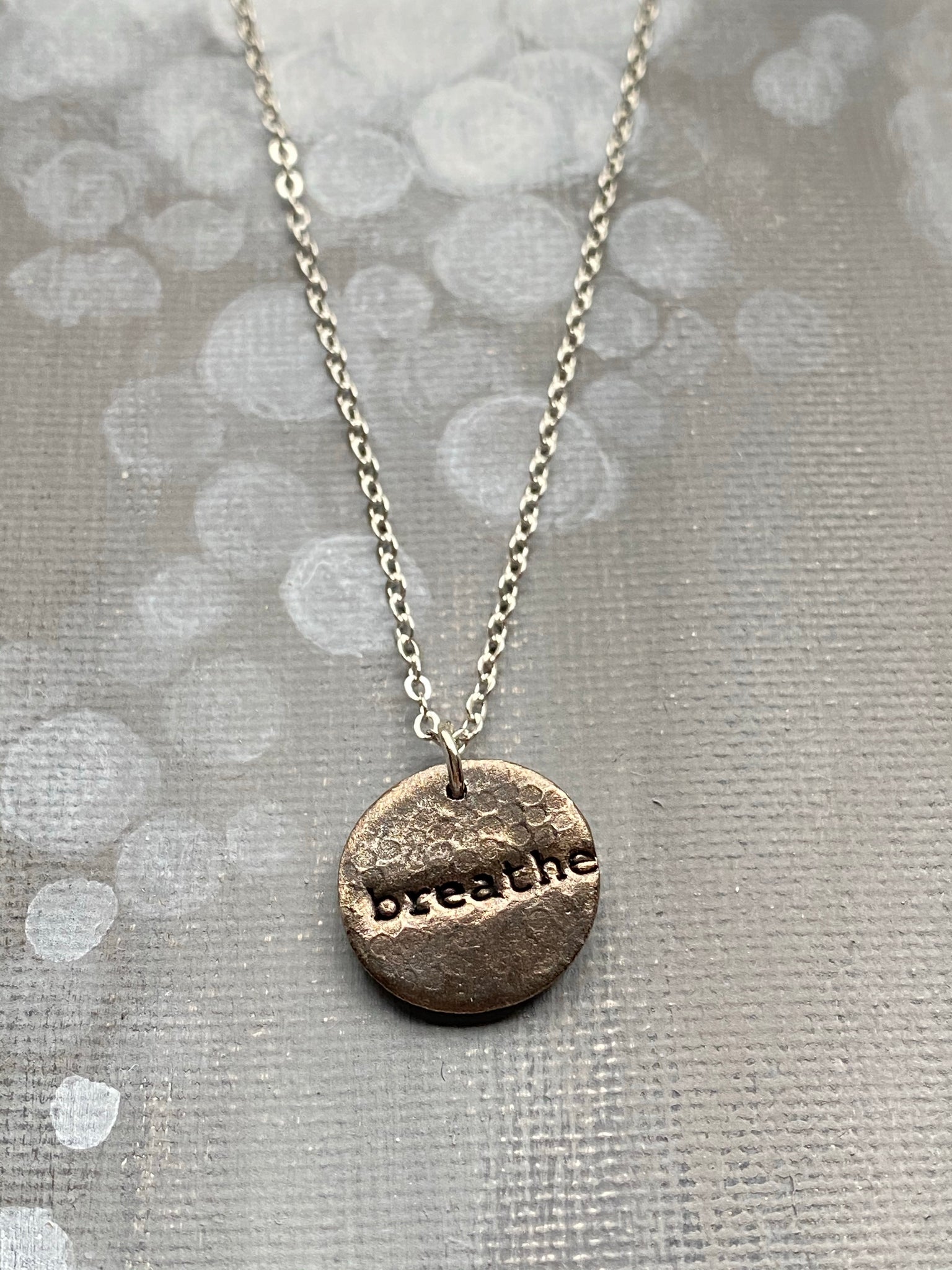 Breathe Hand Stamped on Circle Steel Charm Necklace