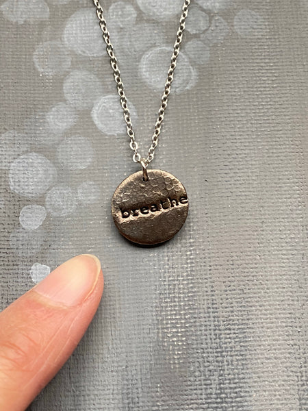 Breathe Hand Stamped on Circle Steel Charm Necklace